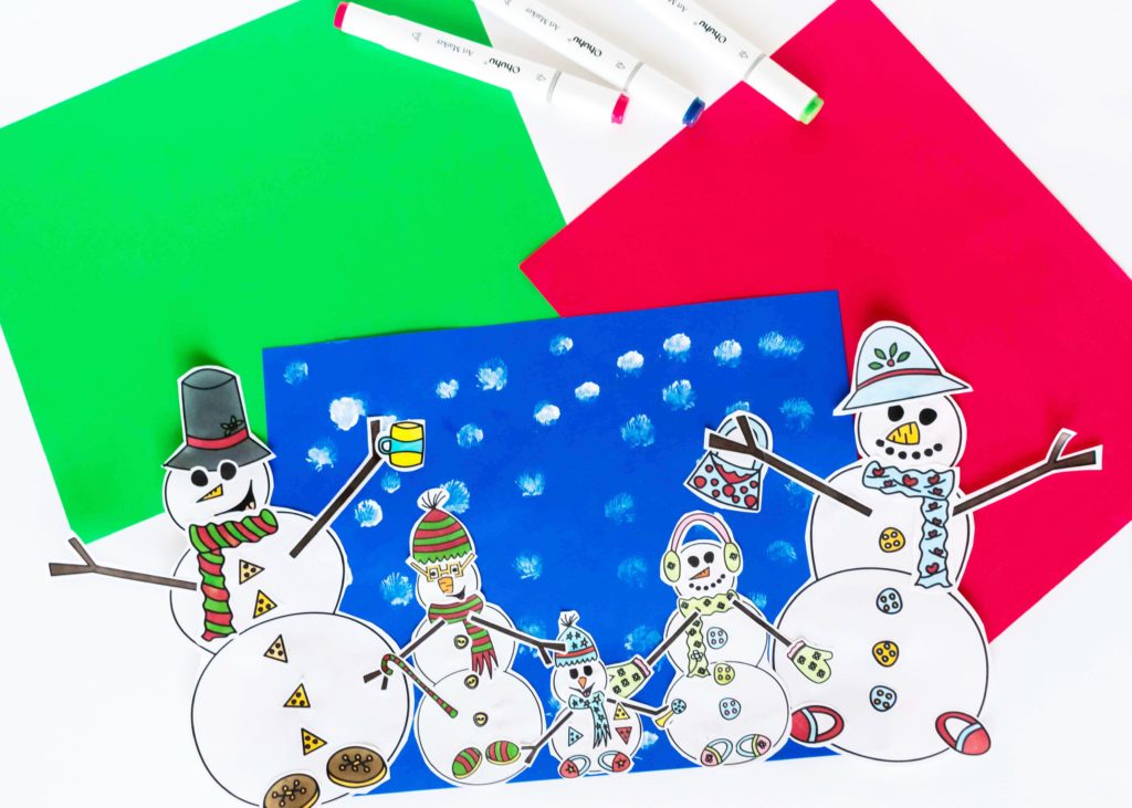 paper Snowman craft for kids on construction paper.