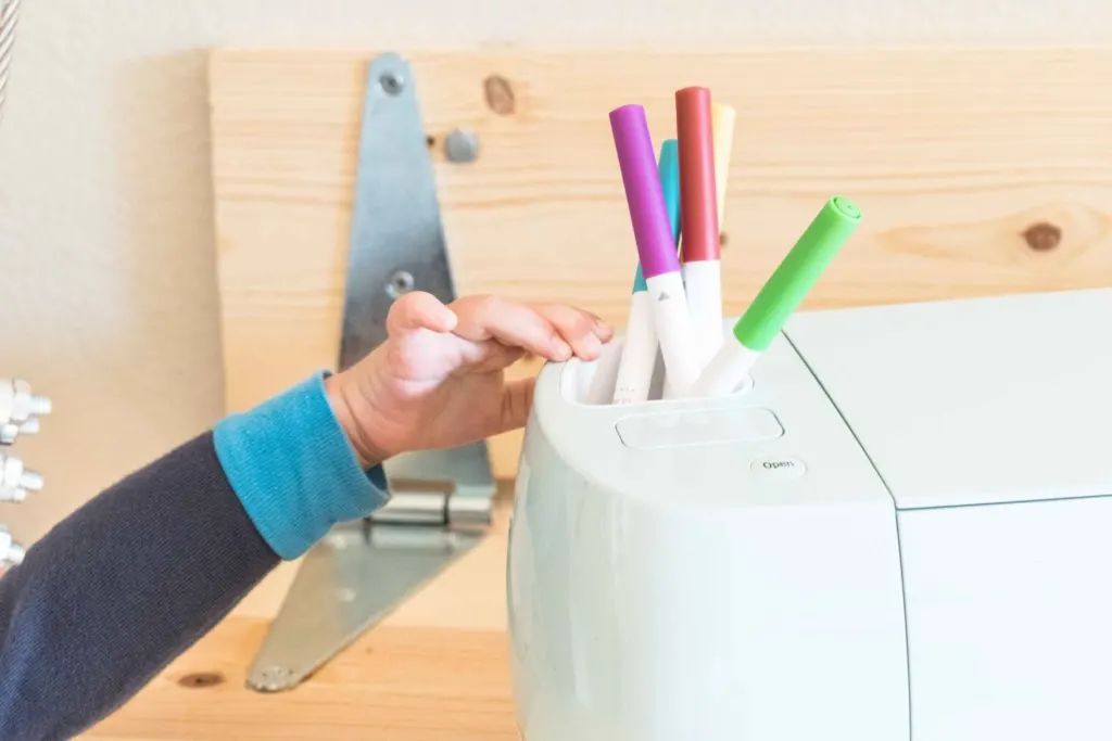 Cricut Explore (Kid trying to reach it)