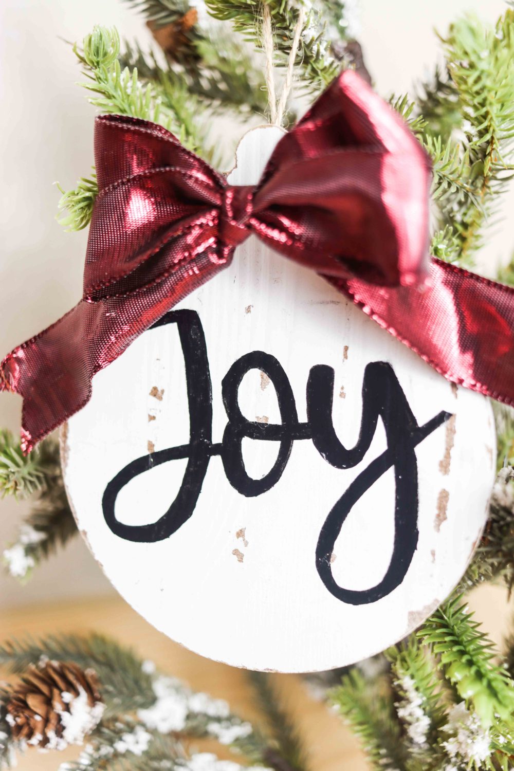 Beautiful wooden Christmas Ornament hanging on a Christmas Tress