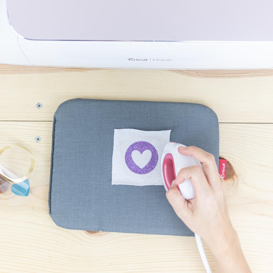 Pressing Glitter Iron-On on fabric