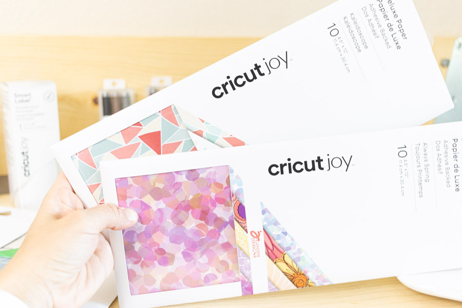 Holding Cricut Joy Deluxe Paper 