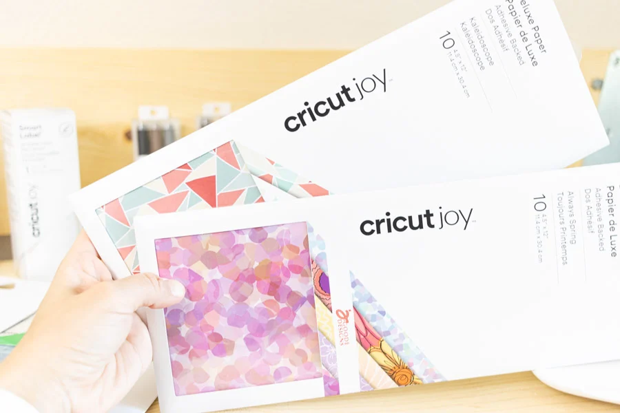 Holding Cricut Joy Deluxe Paper 