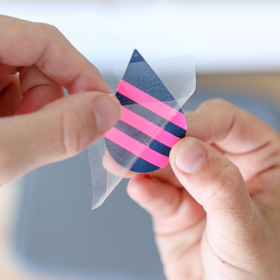 removing heat transfer tape from iron-on on earring.