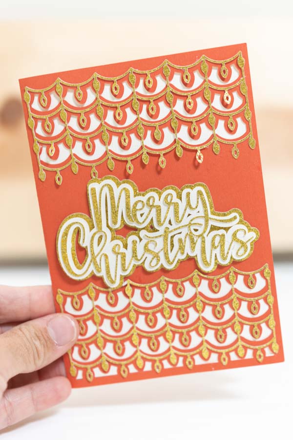 merry christmas card with little light bulbs