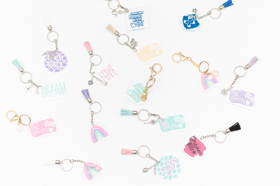 multiple personalized keychains made with cricut machine