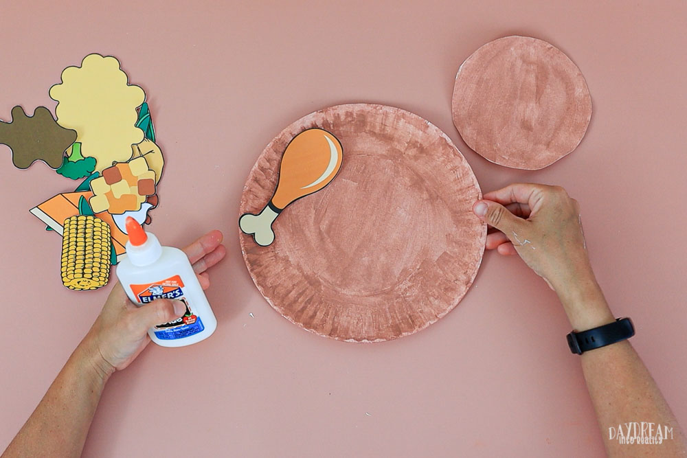 glue turkey left to paper plate craft