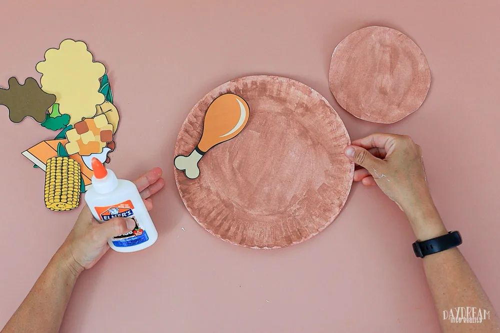 glue turkey left to paper plate craft