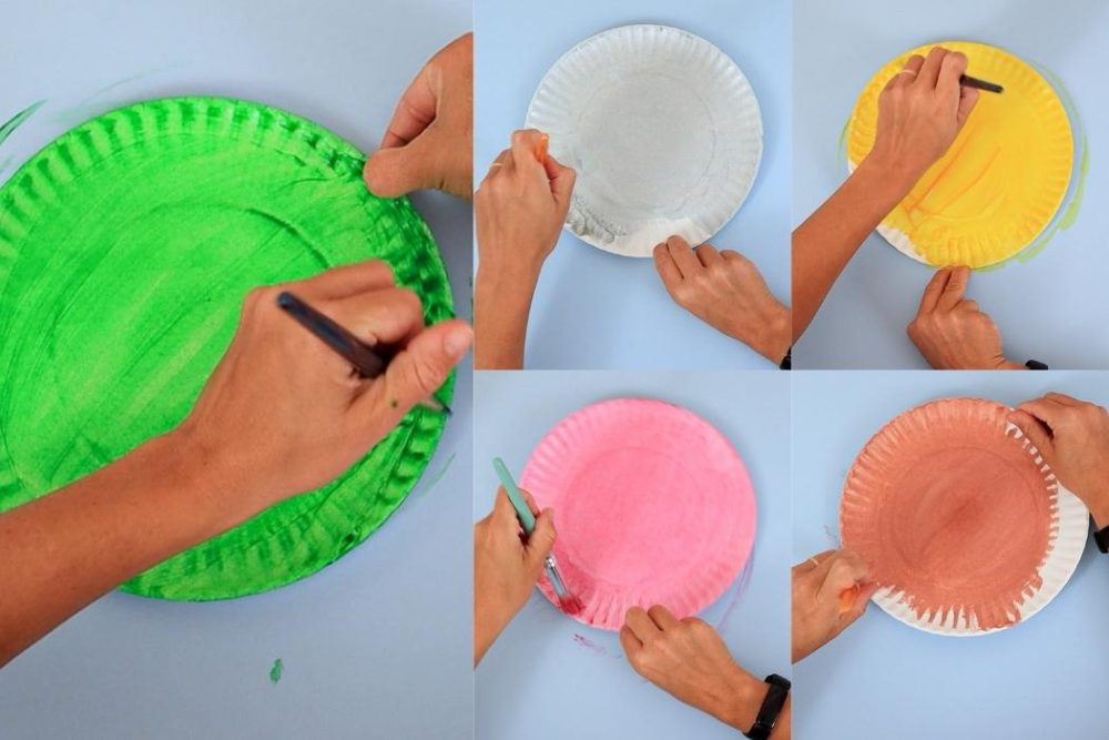 paint a paper plate in different colors for gingerbread house