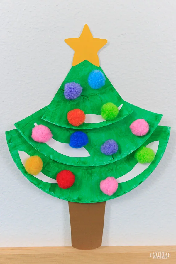 Paper plate Christmas tree made with pom poms