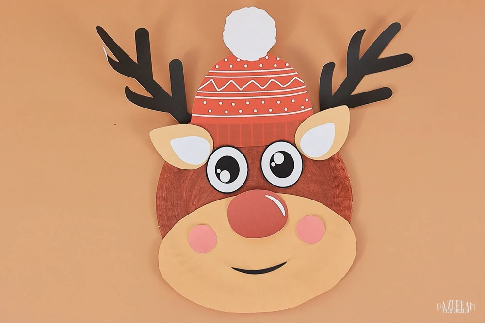 Paper Plate Reindeer Craft for Kids with a red winter hat