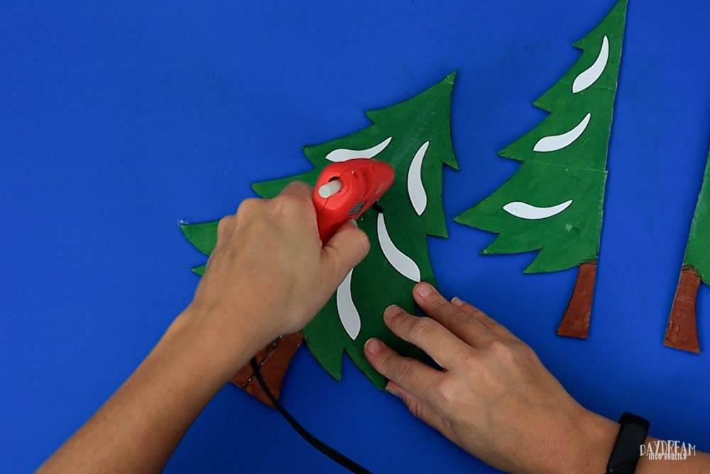 using hot glue to assemble Cardboard tree part 1