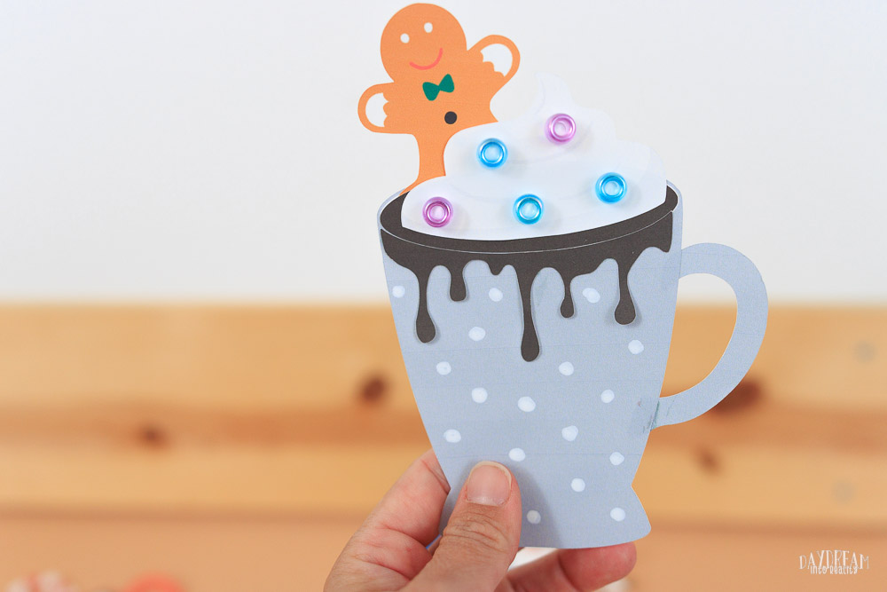 paper hot cocoa craft for kids - grey mug with beads, gingerbread man cookie.