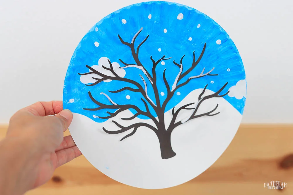 featured image paper plate winter tree scene. Tree with no leaves, during the day.