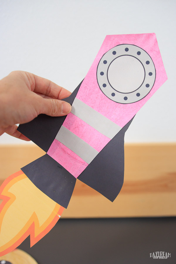 pink paper plate rocket craft for kids.