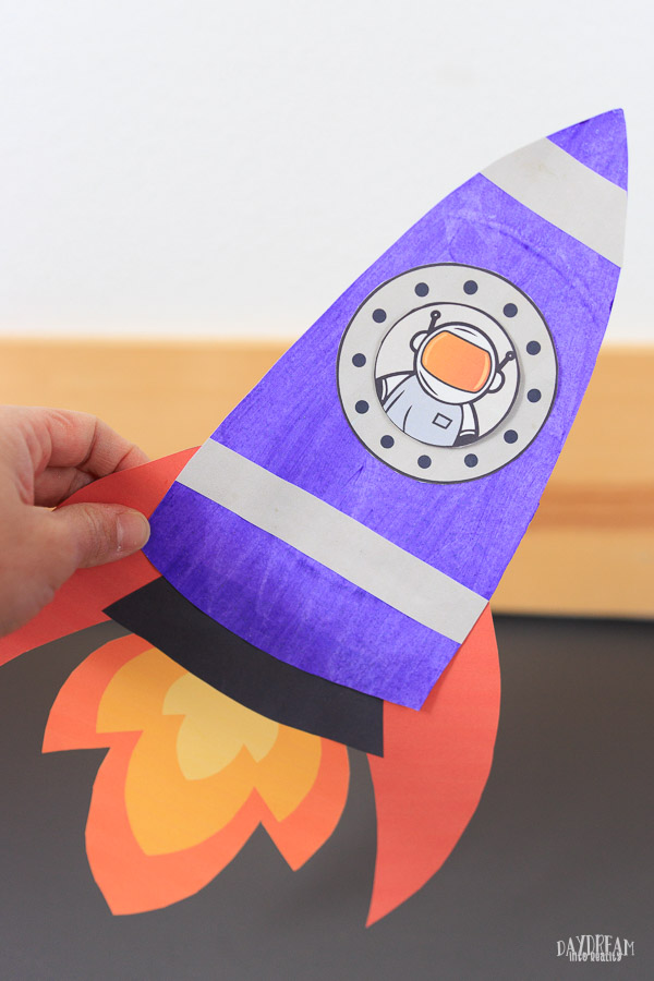 purple paper plate rocket craft for kids. With astronaut!