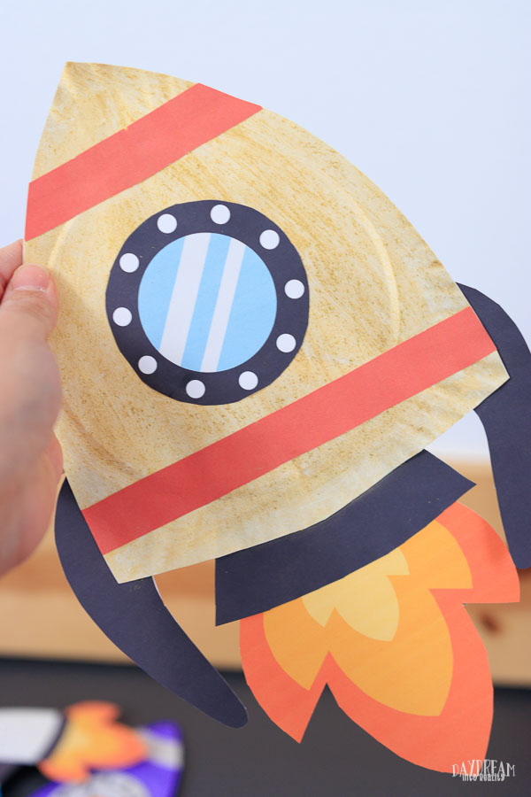 gold paper plate rocket craft for kids.