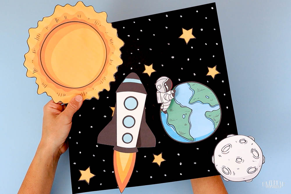 Space Scene Art Project - using magnets to make rocket and astronaut slide